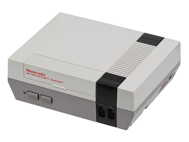 A gray and black Nintendo Entertainment System console with its front-loading cartridge door closed, on a white background