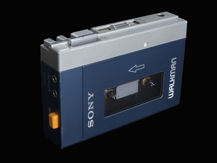 A blue and silver Sony Walkman TPS-L2 cassette player photographed on a black background